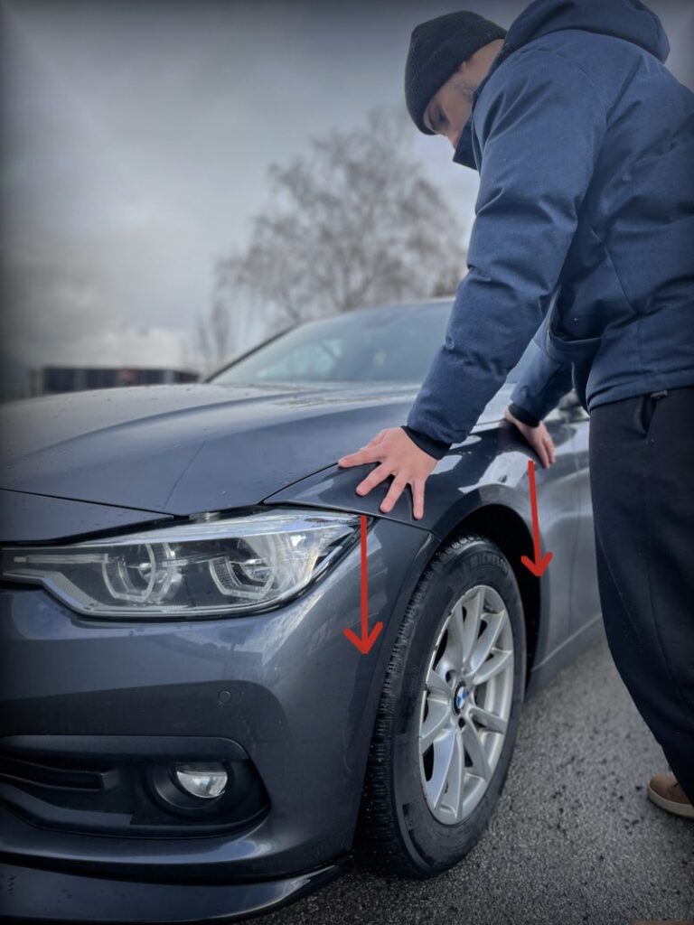 Test amortyzatora. Samochód może kołysać się w górę i w dół. Maksymalnie 2 oscylacje. Test dla listy kontrolnej zakupu używanego samochodu