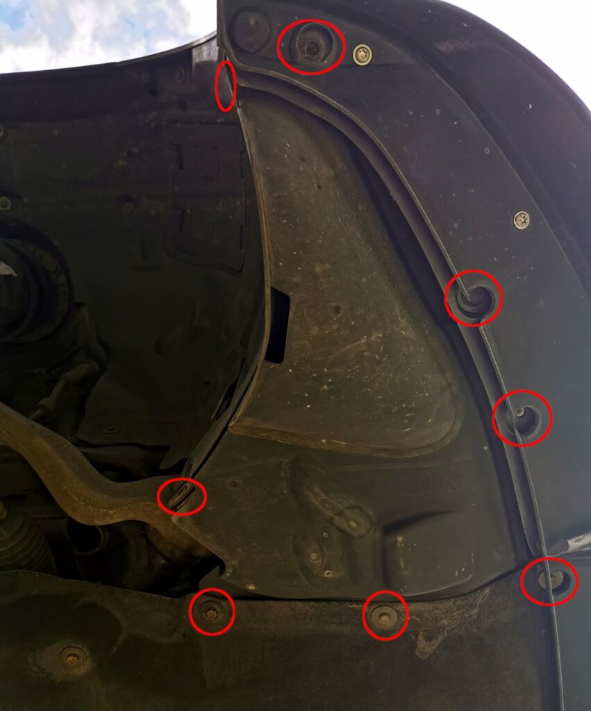 Posiciones de las uniones atornilladas de la tapa de plástico del soporte hidráulico
